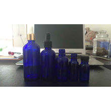 Serie de botella de cuentagotas de vidrio de alta calidad azul cobalto